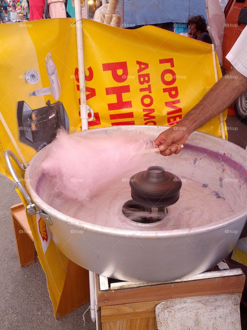 The process of making cotton candy at a street fair in a small village in Bulgaria