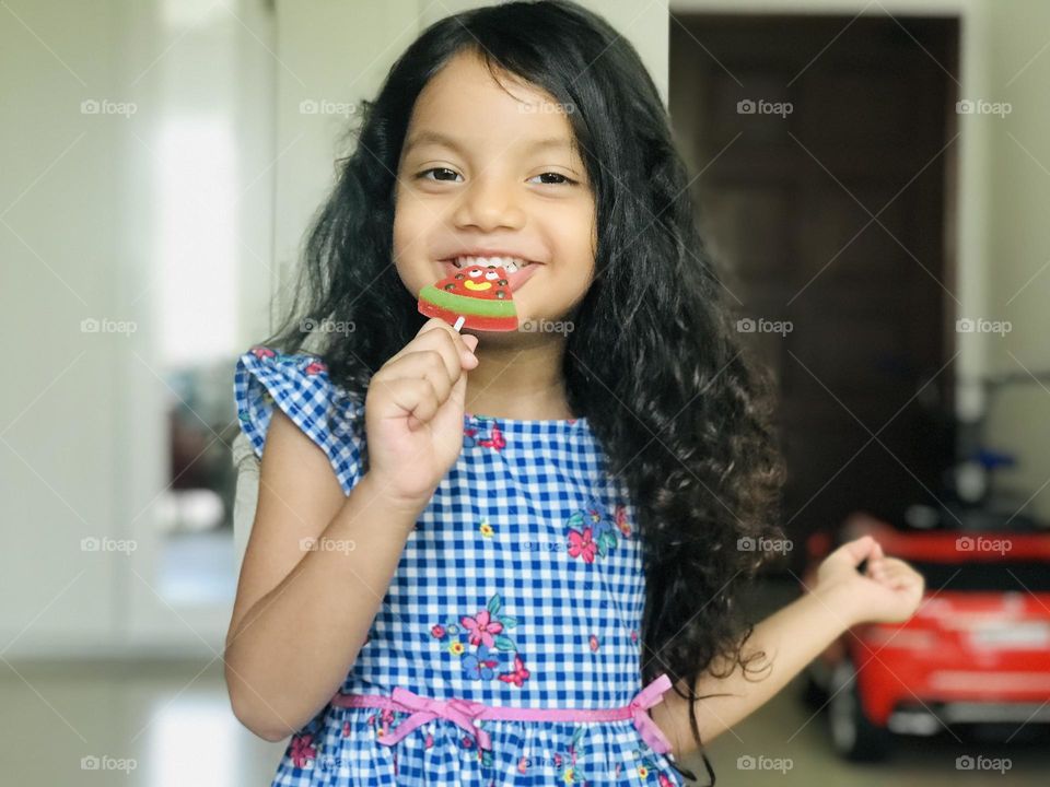 Beautiful Indian girl black and long curly hair 