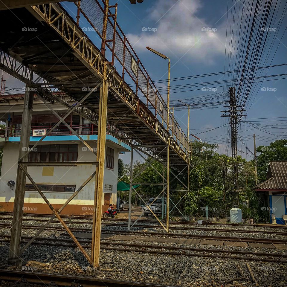 Public walkway over the track at Phitsanulok railway station, Thailand 