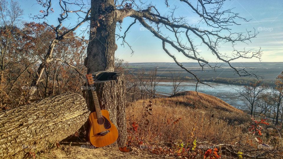 I like to being my guitar to the woods and prairies of Illinois. Taken at Fults Hill Prairie.