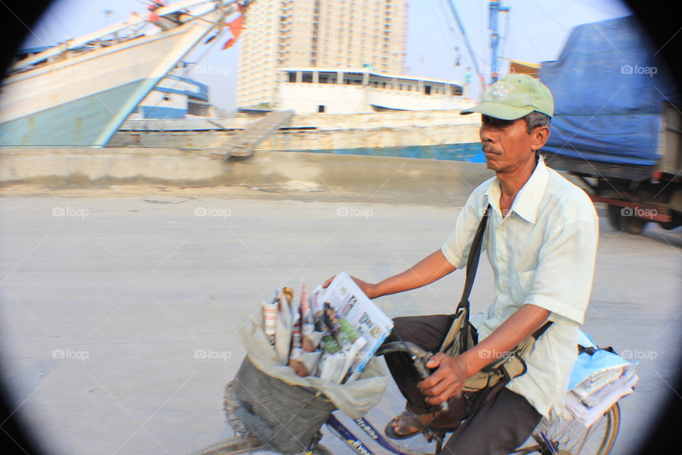 a newspaper seller. a newspaper seller and opened a bicycle rental