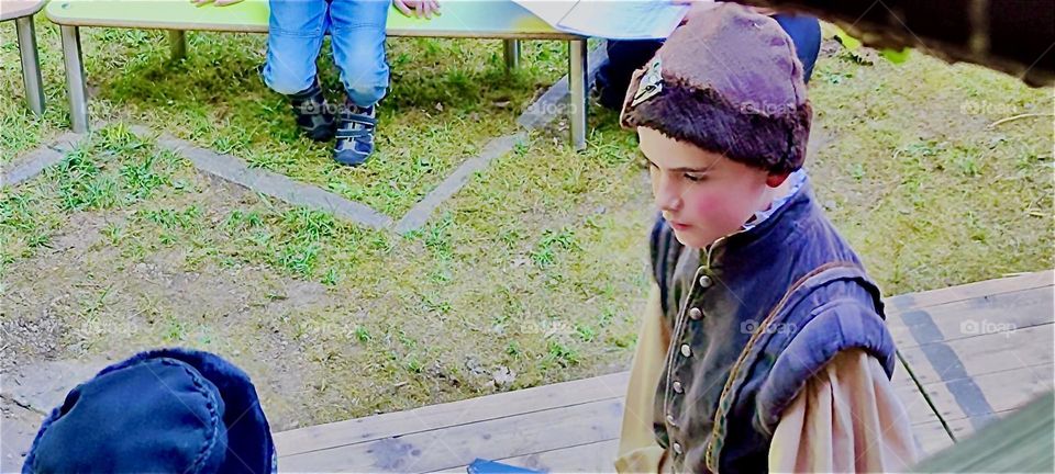 This boy plays Duke “Albrecht” in “Da Albrecht und sei Agnes”, the child version of the historic play about the duke and his common wife “Agnes Bernauer” who is put to death by her inlaws in a witch trial while he is away. 2024. Hypnotic Productions