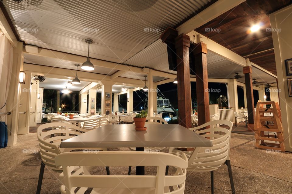 Table inside restaurant at night with nobody 