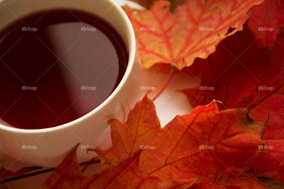 Autumn leaves and black tea