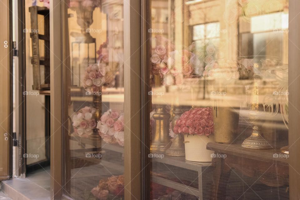 Windows reflection in a flowers shop
