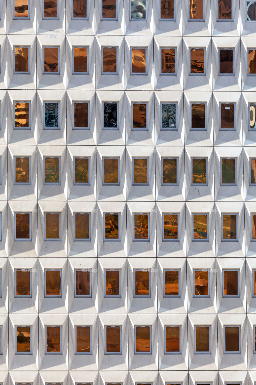Repeated abstract pattern of building's windows