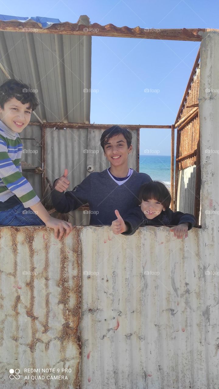 This is a picture of the boys entering the abandoned hut and from behind the seashore