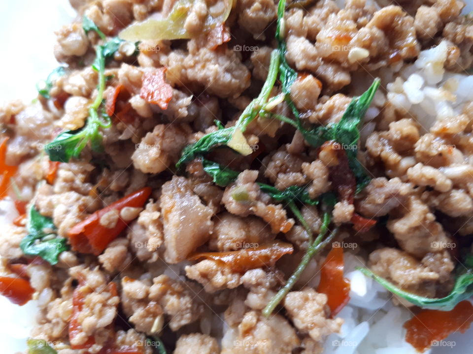 Rice topped with fried stir basil and minced pork (Khao pad krapao moosab)