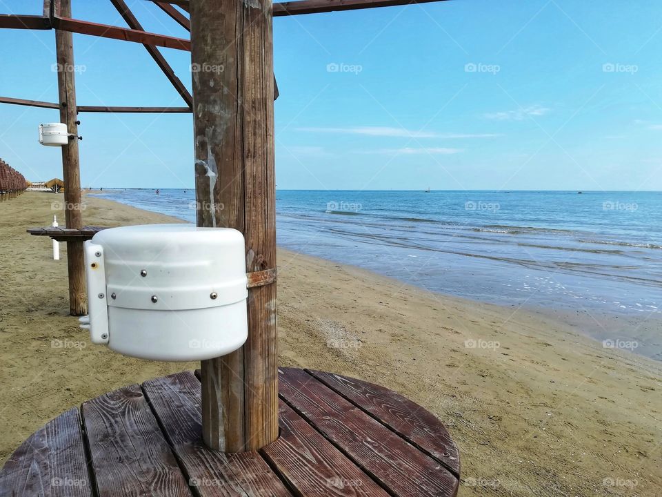 Small safe under beach umbrella