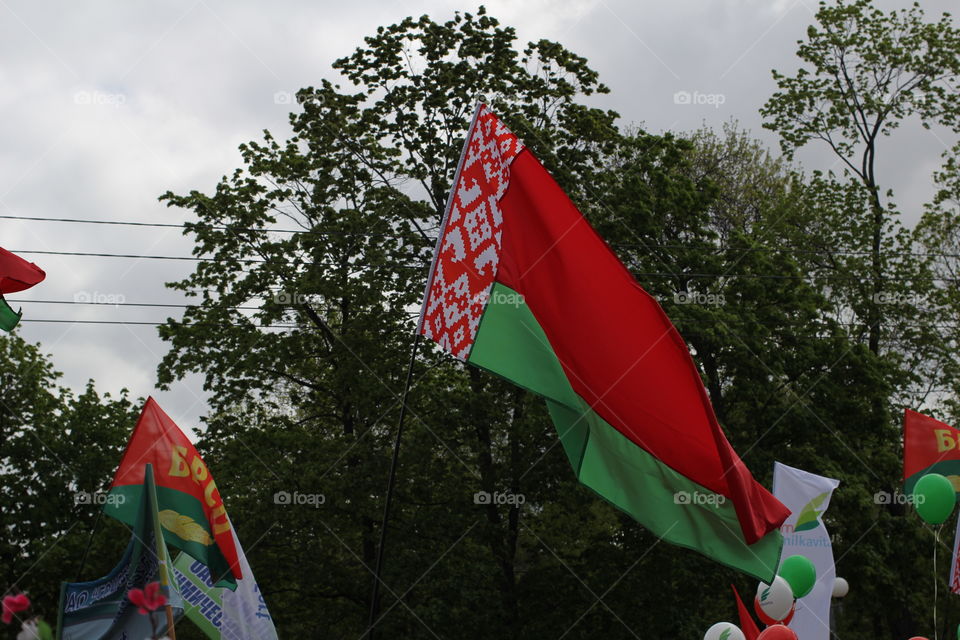 Flag of Belarus, flag of the Republic of Belarus. A parade dedicated to the Victory Day. May 9, 2017. Belarus, Gomel. Reportage photo.