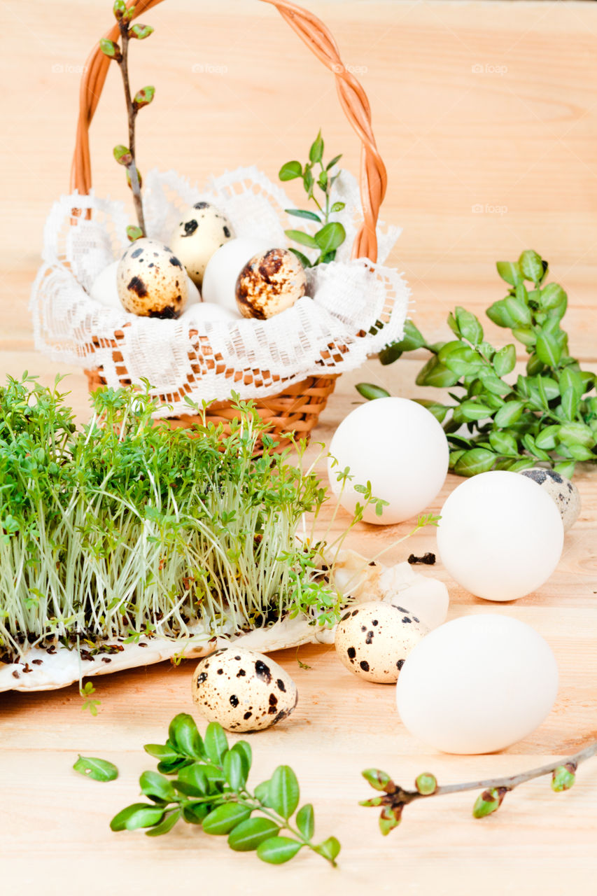 Preparing basket with eggs for blessing at Easter