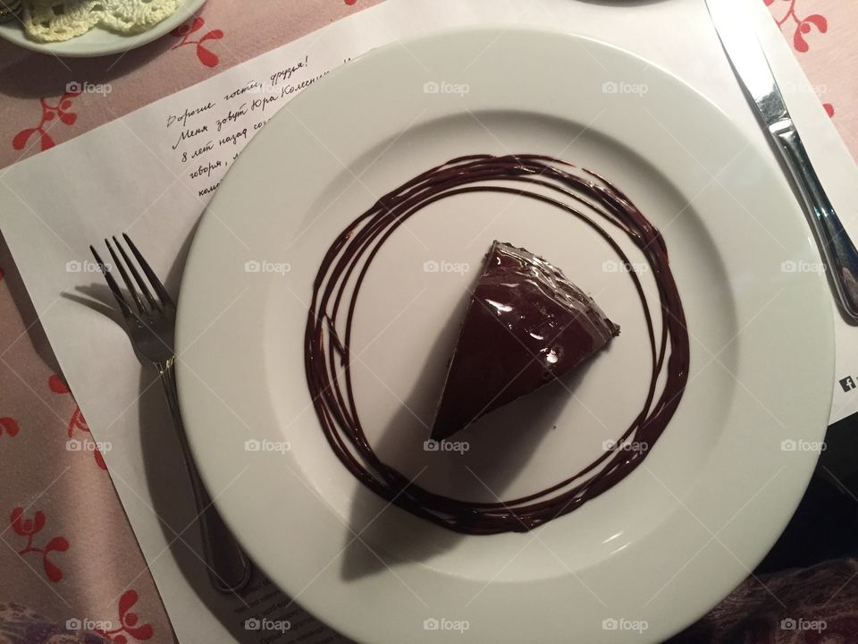 Chocolate cake on a white plate