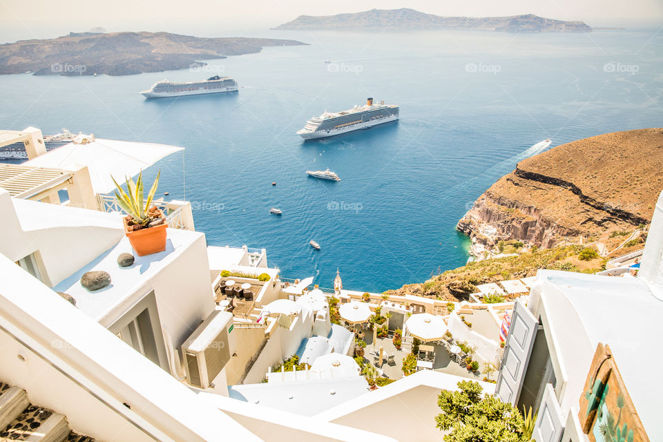Top View Of The Caldera Cruise Ships And Boats In The Sea On Famous Greek Island Santorini