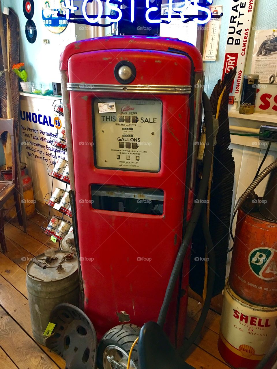 Old red antique gas pump 