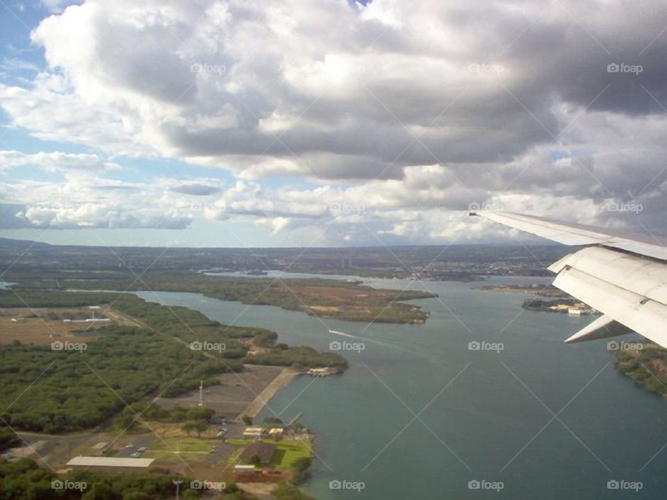 Pearl Harbor Seen From Plane. Looking down on Pearl Harbor from the plane as we were coming in for landing in Oahu Hawaii .