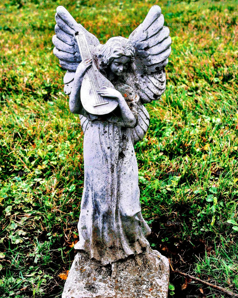 Angel stone in cemetery
