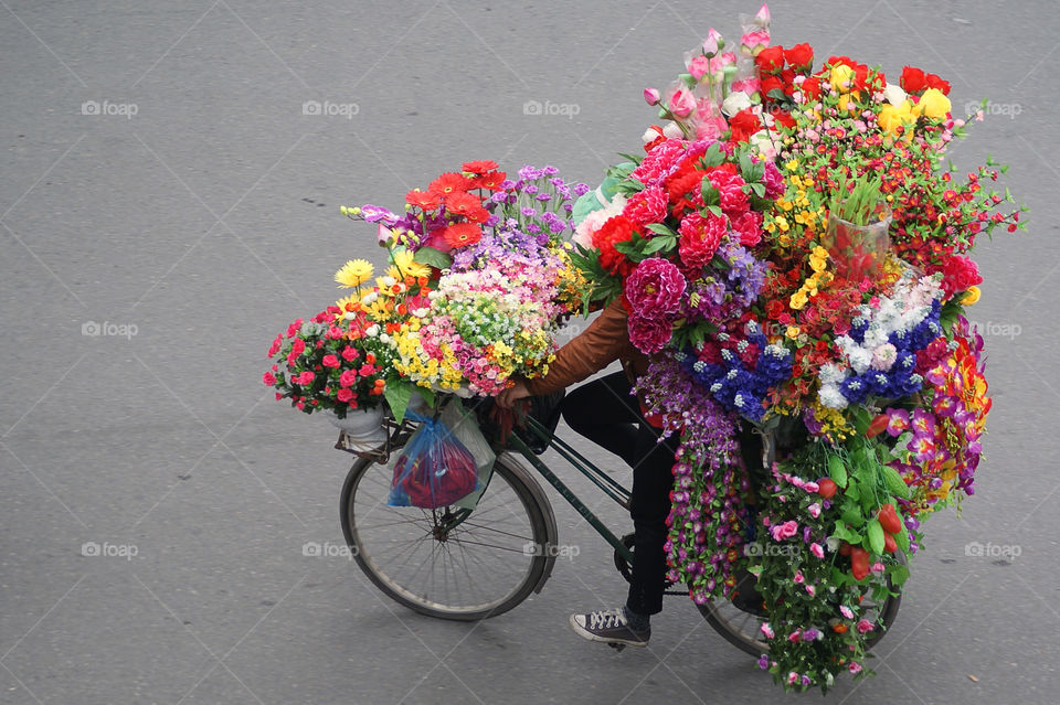 Flower bicycle . High quality photo. Hanoi street life. 1/200sec. ISO100. f/4.5