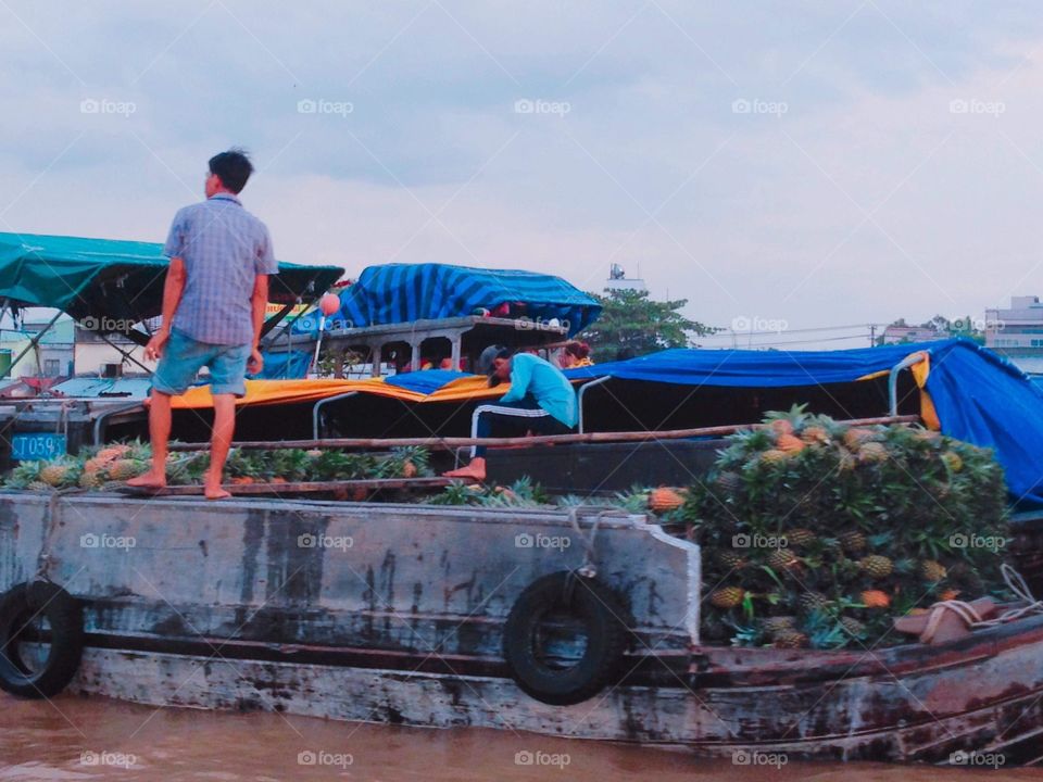 Market on boat at Can Tho Province (Vietnam)