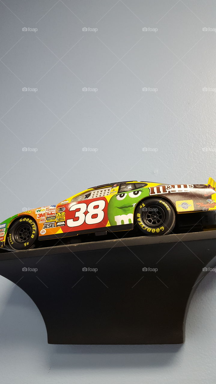 mini race car on a shelf