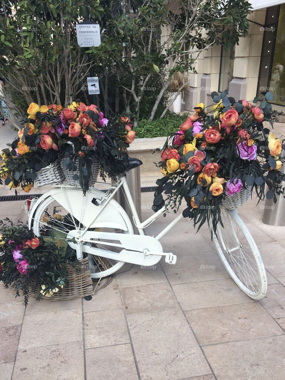 Flowered bicycle as decoration in city