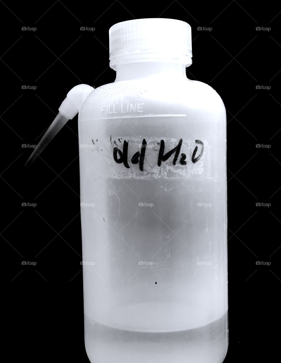 A distilled water bottle in a laboratory 