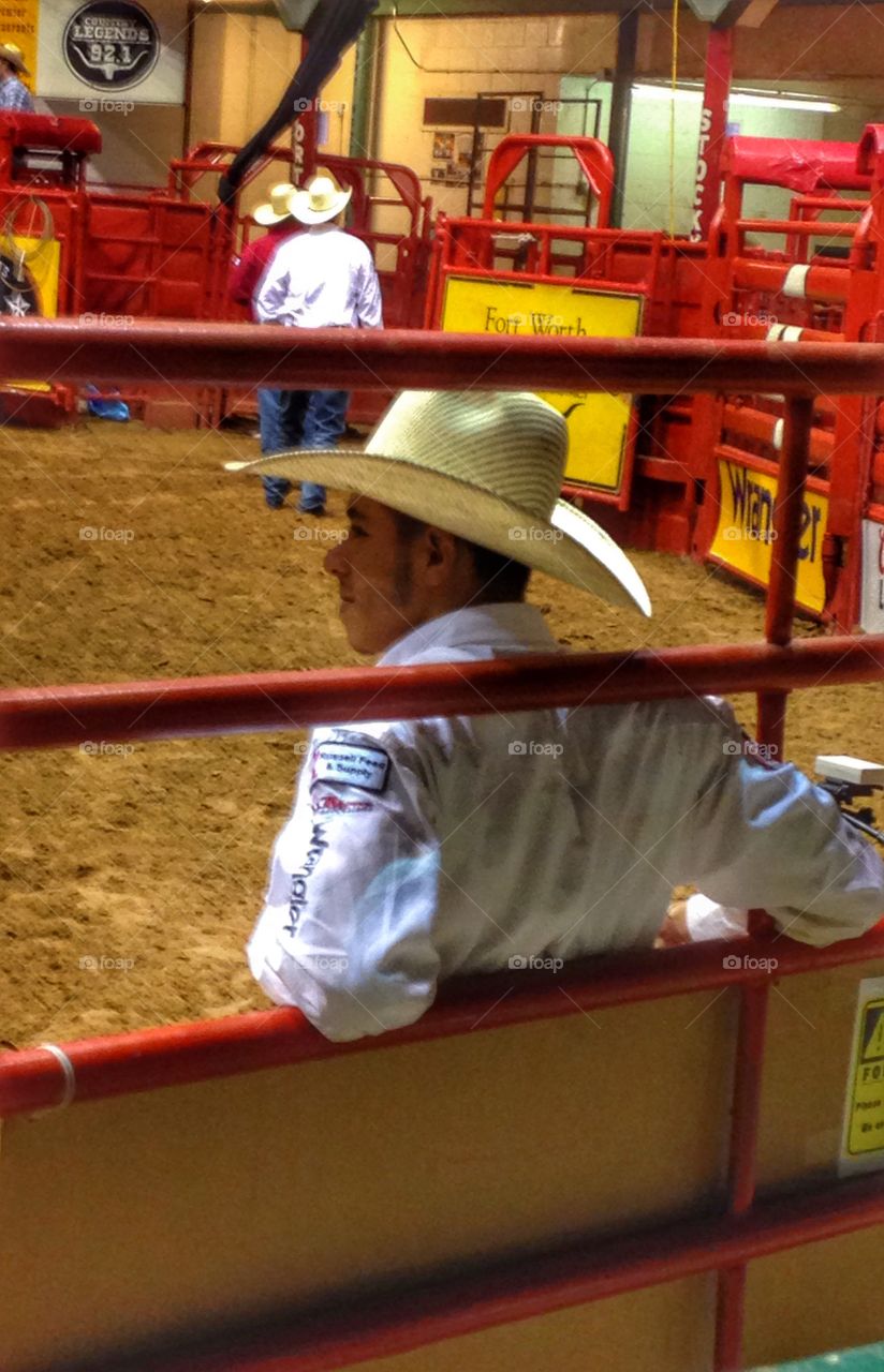 Relax before the ride. Cowboy resting before riding in a rodeo 