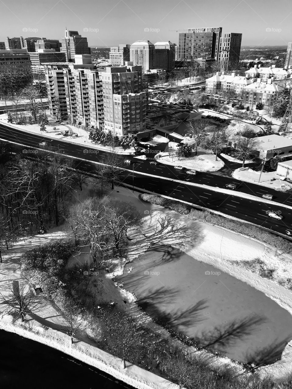 Light snow cover the city