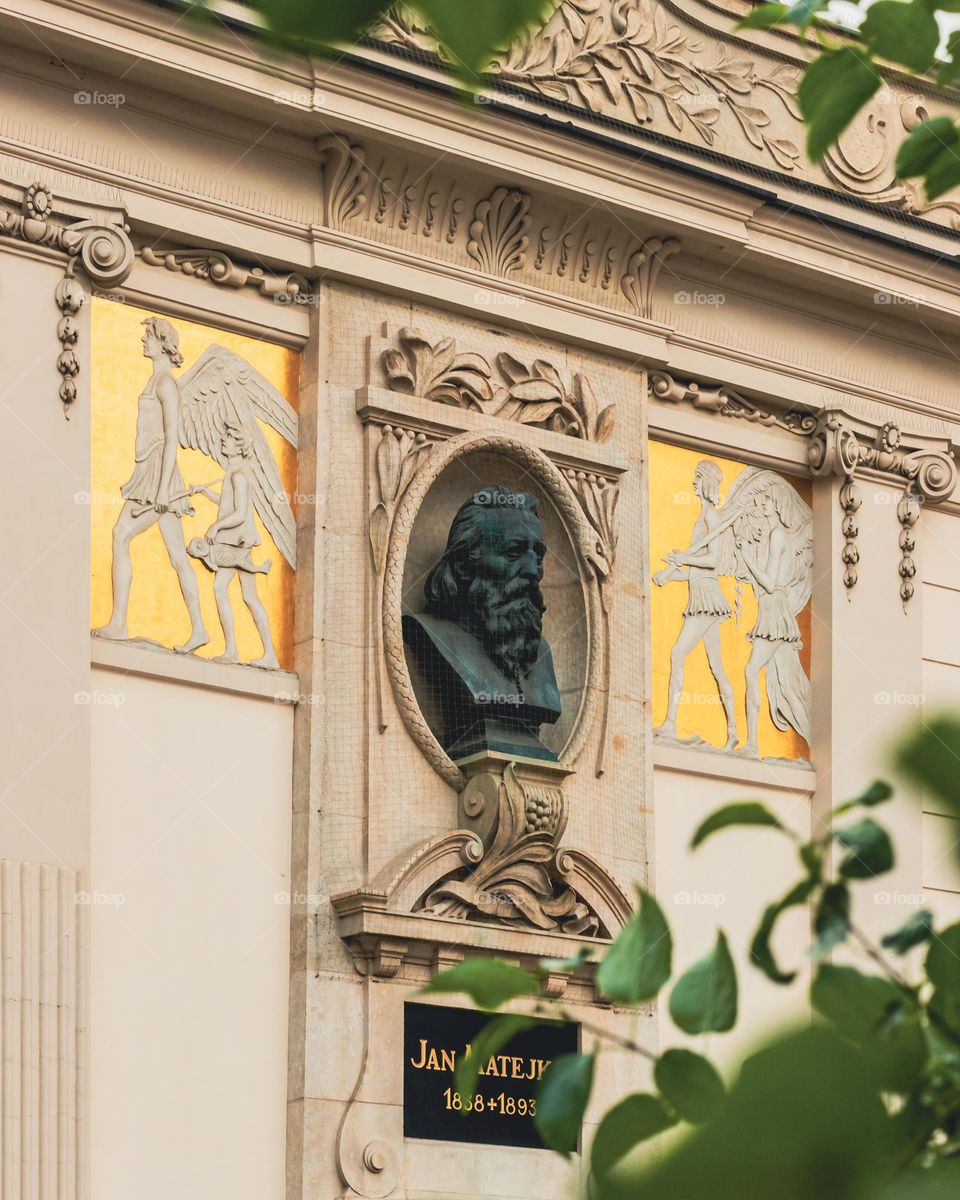 a fragment of a beautiful facade of a tenement house on Jan Matejko Square in Krakow