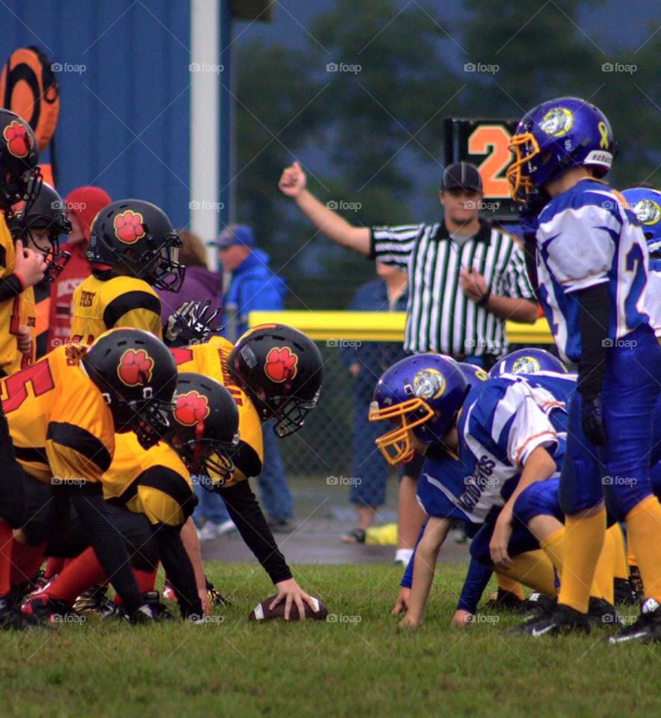 Down, Set, Hut!. Youth football teams going head to head. 