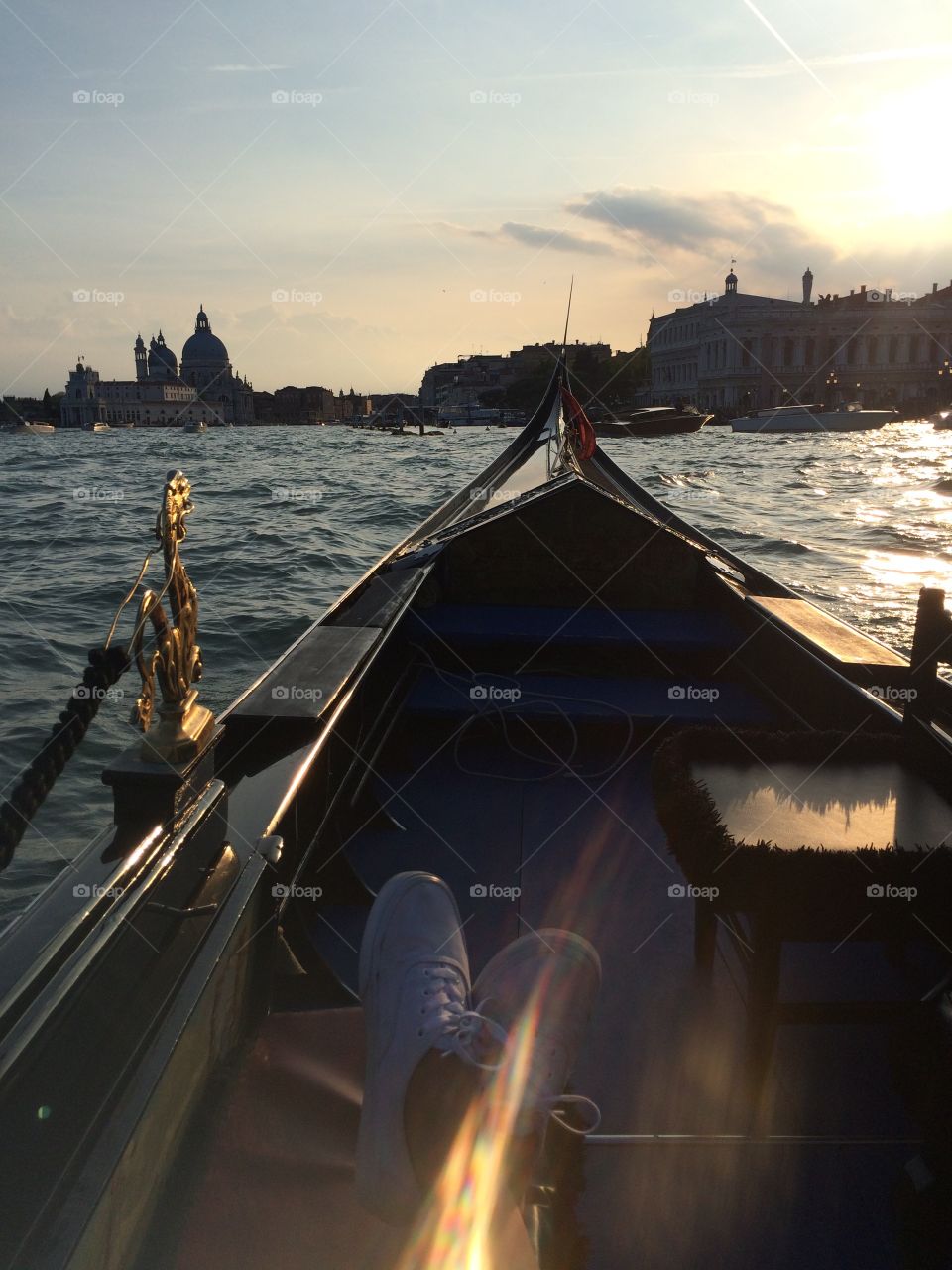 Sunset gondola ride in venice, Italy.