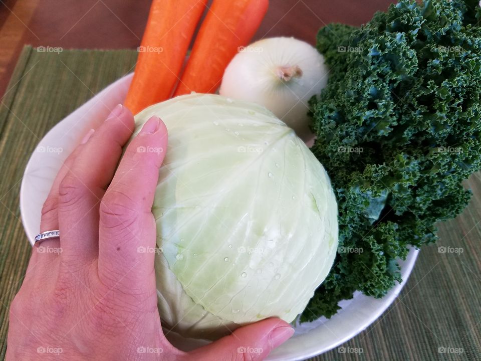 Holding cabbage