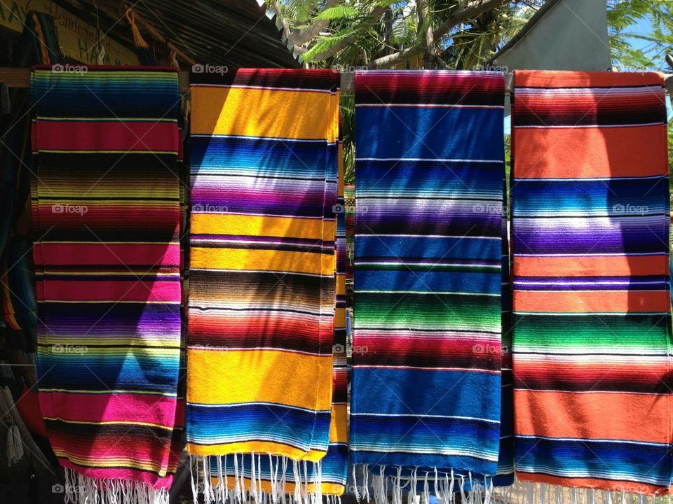 Bright blankets hanging in Mexico 