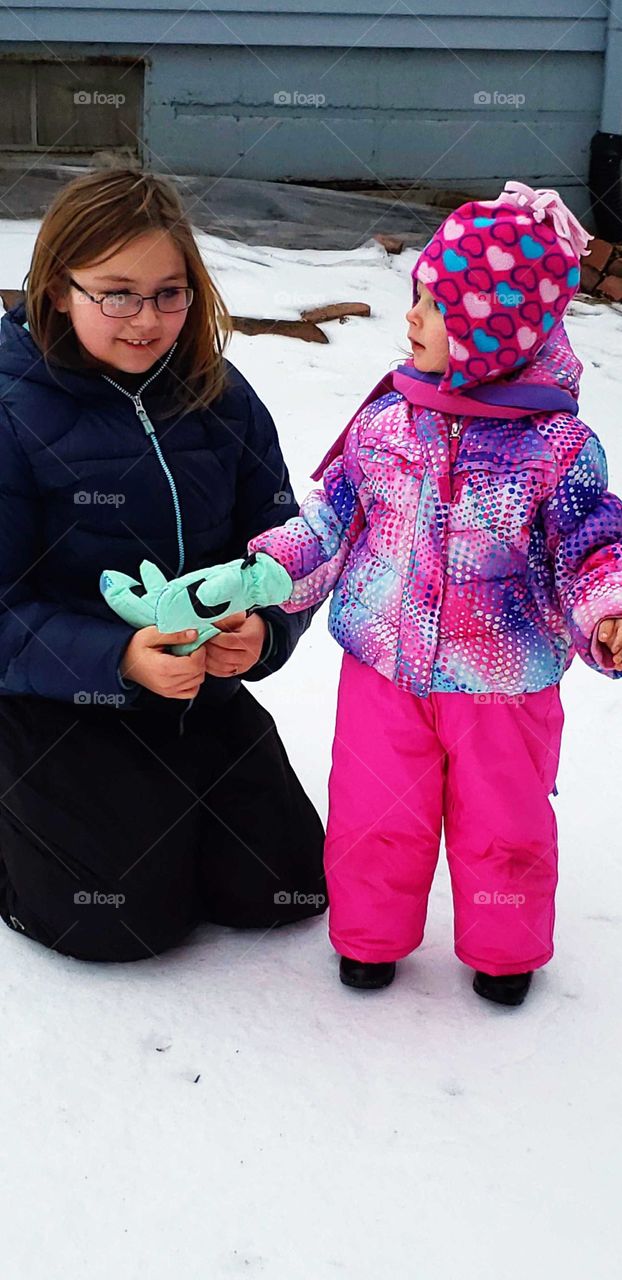 playing in the  snow