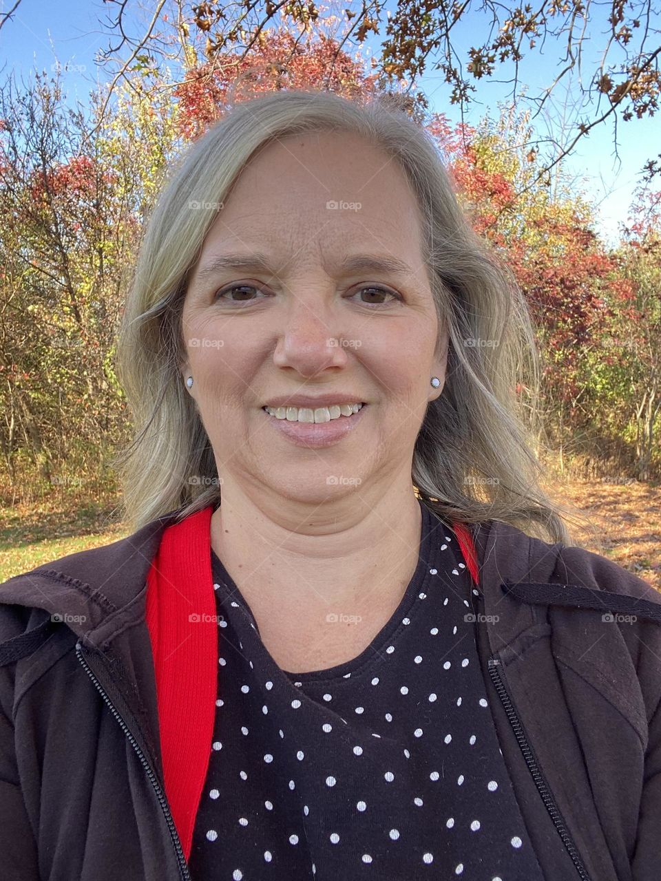 Me wearing my black and white polka dot shirt, and matching white “dot” earrings on a recent walk during my lunch hour at work. I try to get outside if the weather cooperates, and this was a beautiful Fall day. The Polka Dots reflect my happy mood.