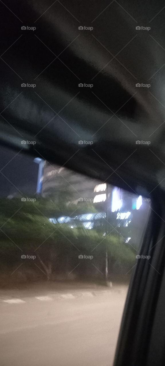 Twinkling windows , the beauty of evening light. Bask in the beauty of evening light with the view of light twinkling from these windows at night