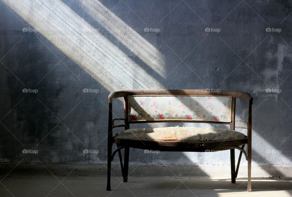 Sunbeam in the room on the empty bench