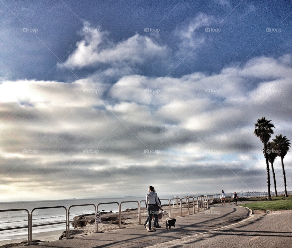 beach sky woman clouds by analia