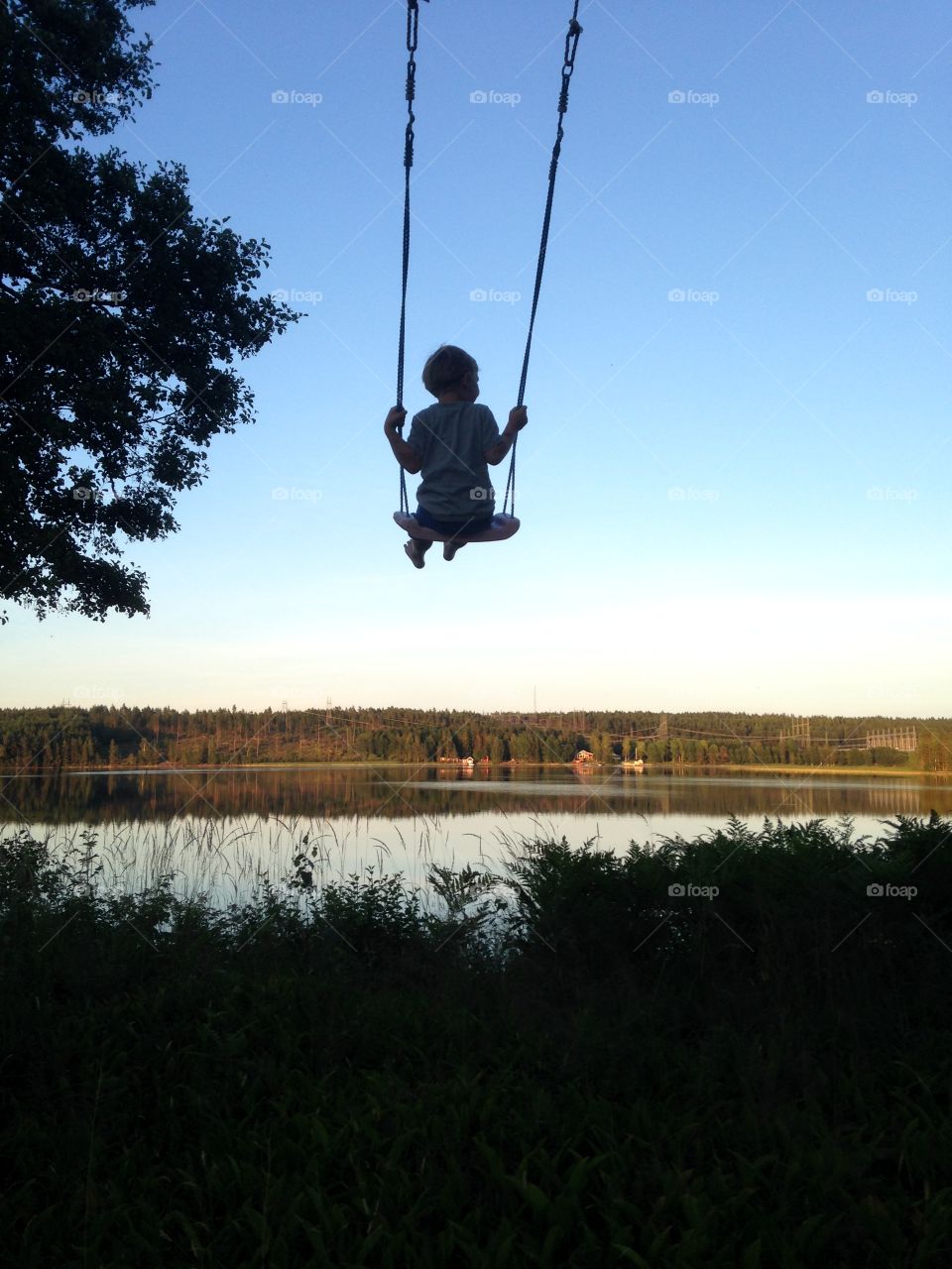 Kid in swing