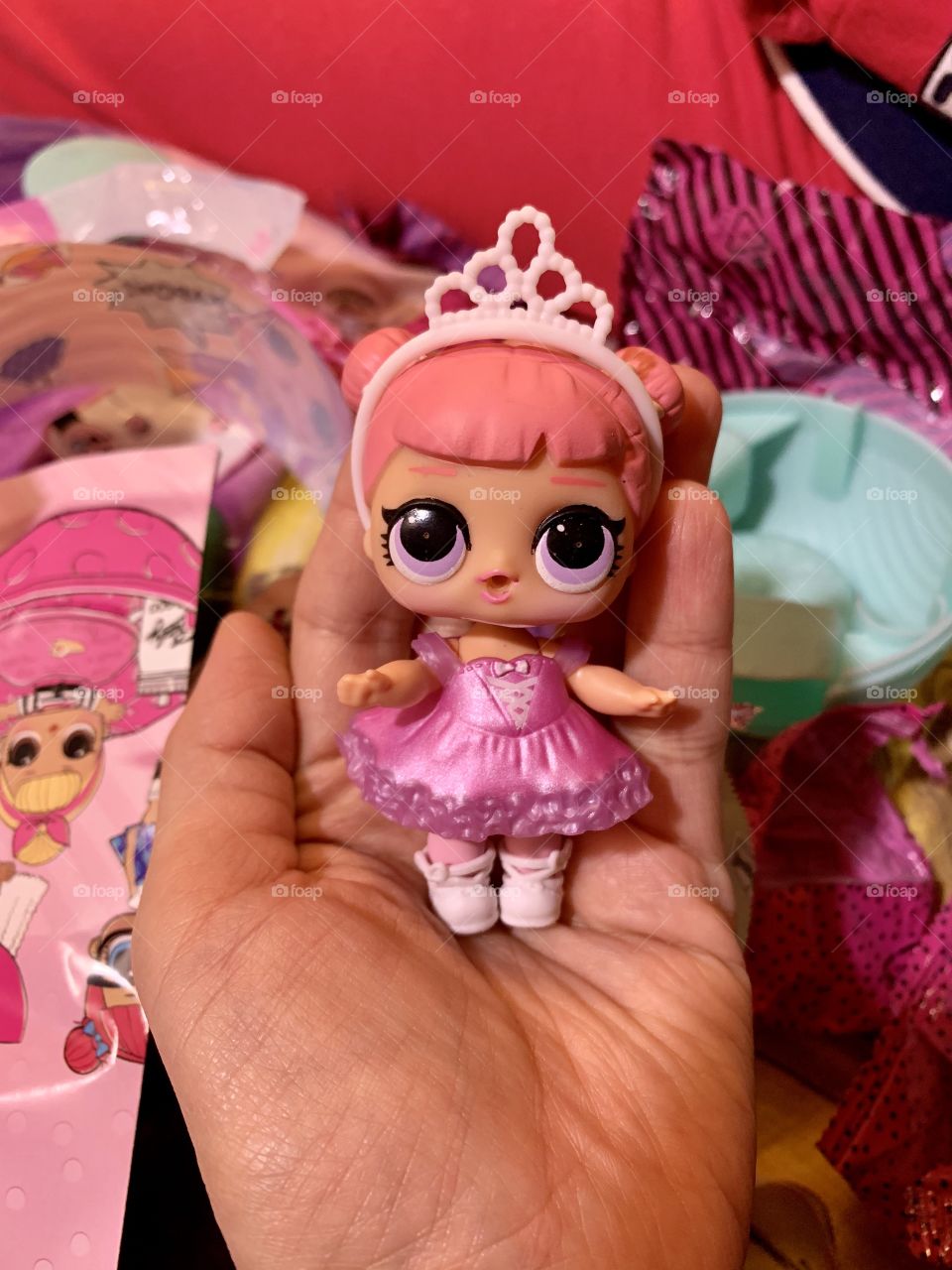 here she is baby Center Stage. Cute baby doll in a pink dress with a tiara on her head