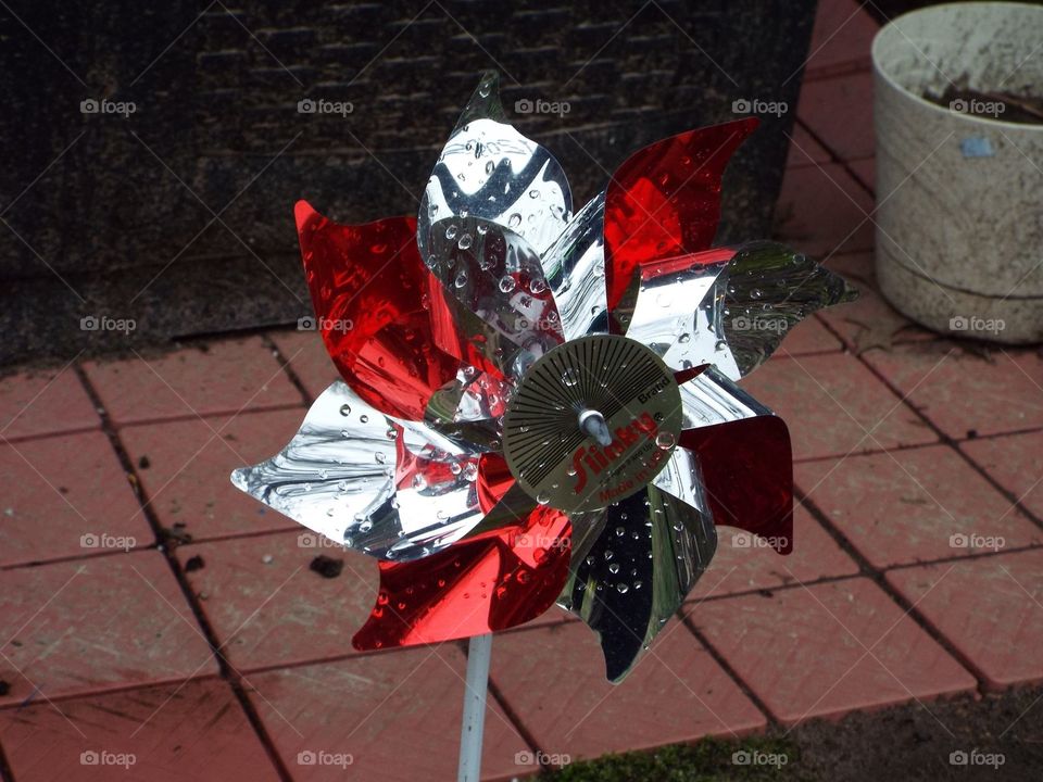 Pin wheel with rain drops 