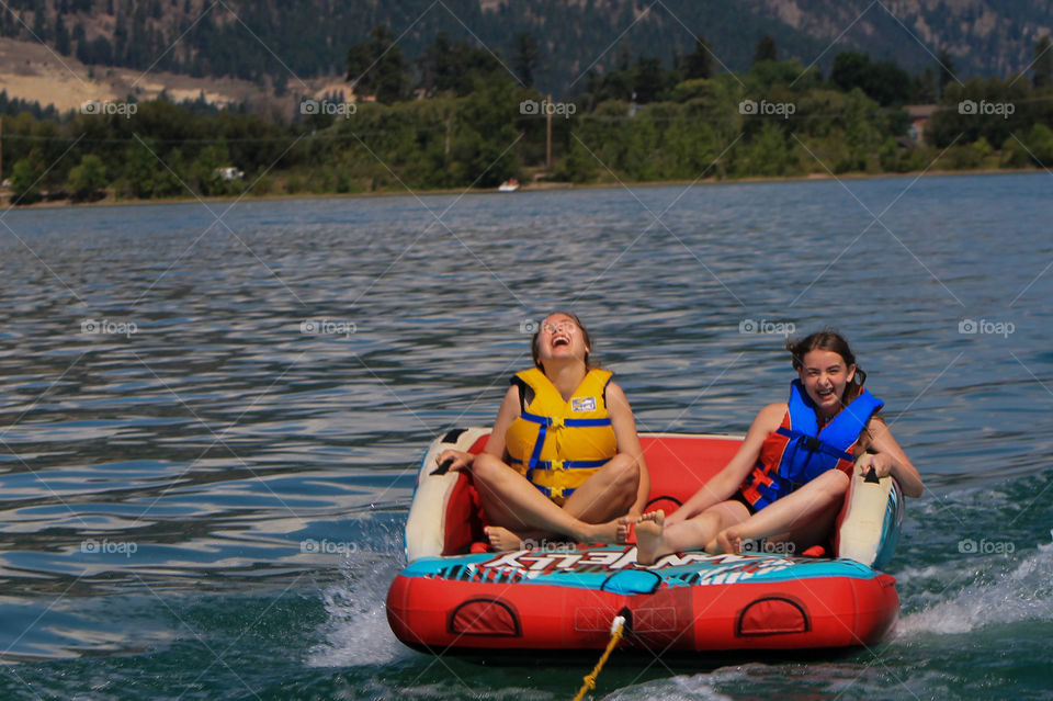 Summer memories: The kids had a riot towed behind our rented pontoon boat. They bumped on the float to get an even bigger jump when they hit the wake waves. Their hoots & hollers echoed around the lake & it was such a joy to see them having fun! 