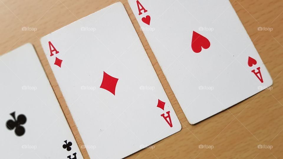 Playing cards game three aces