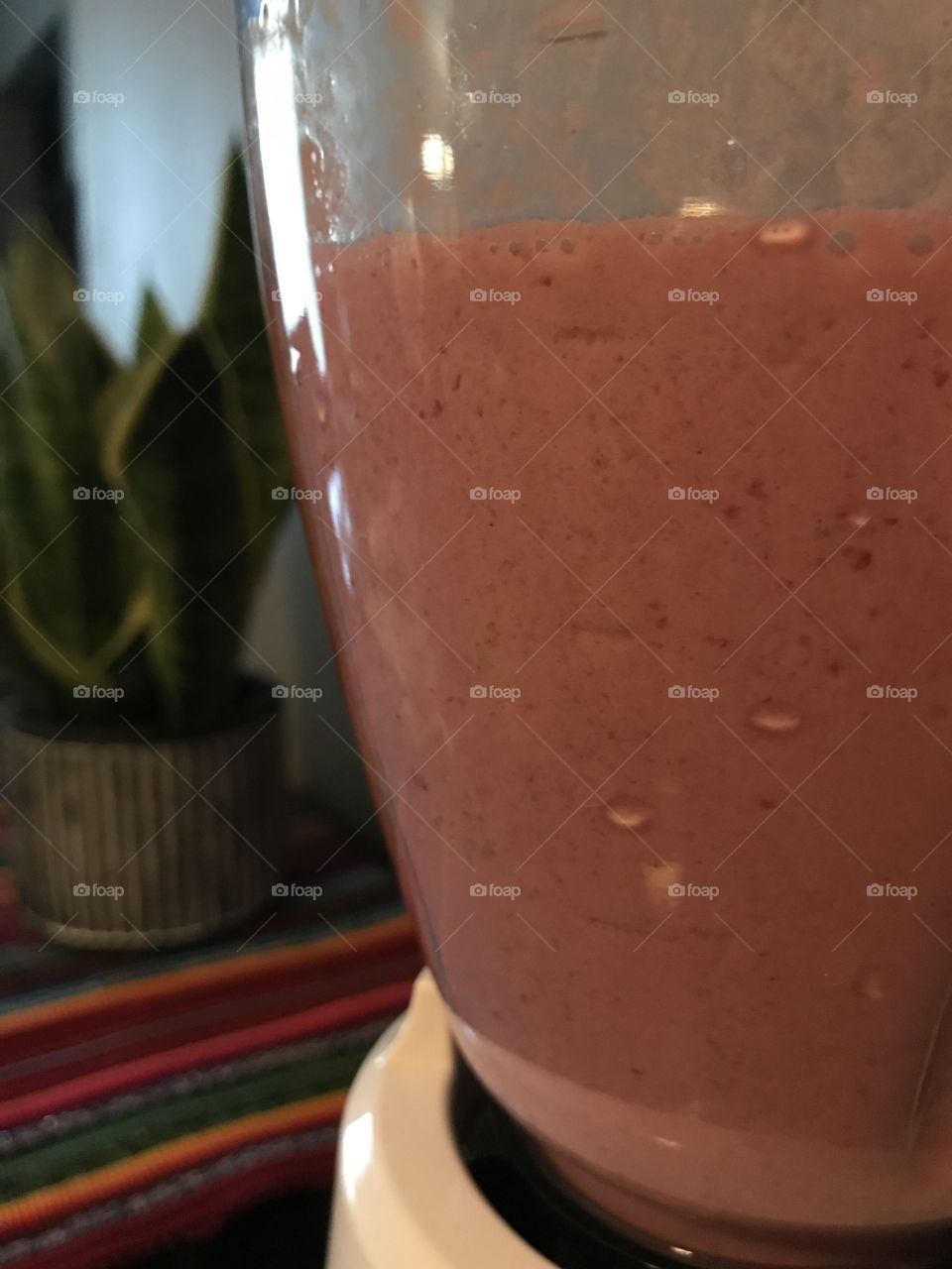 Strawberry smoothie in the blender