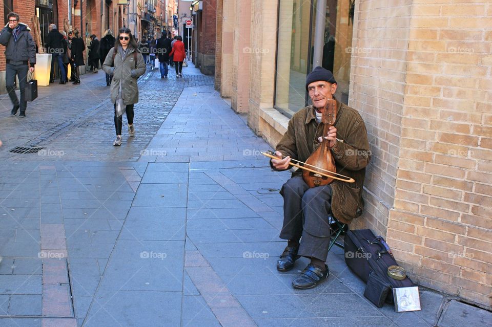 old musician in the street