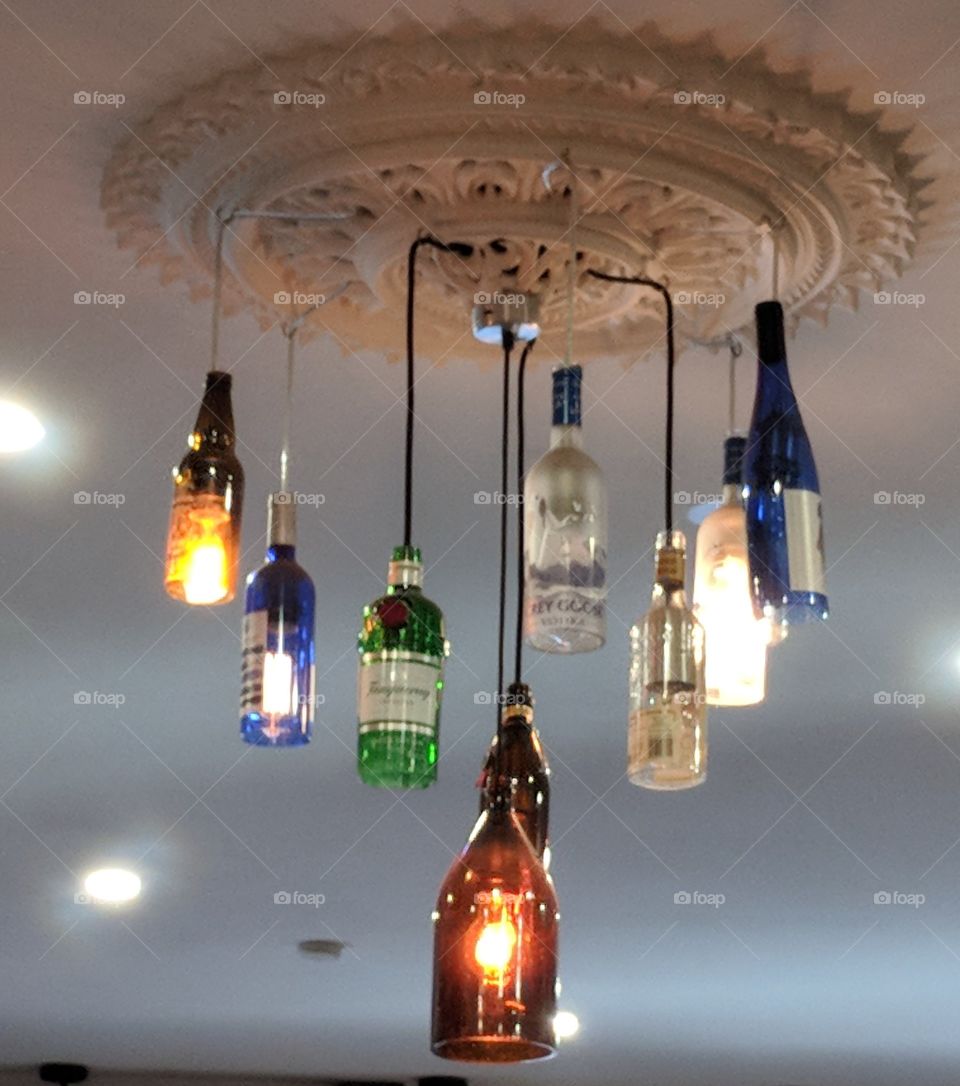 Recycling coloured glass bottles for chandelier lighting