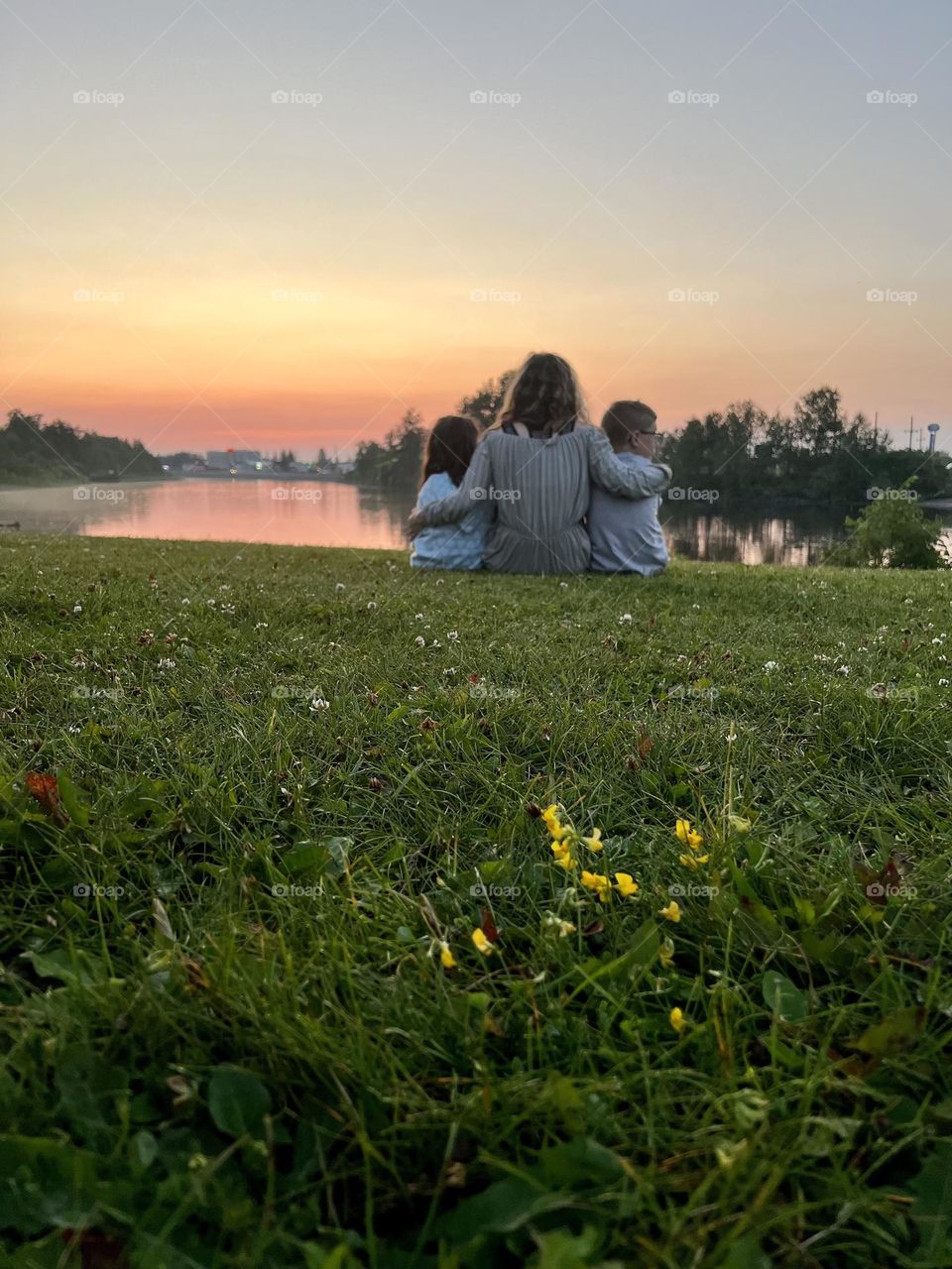 Siblings watching the sunset 