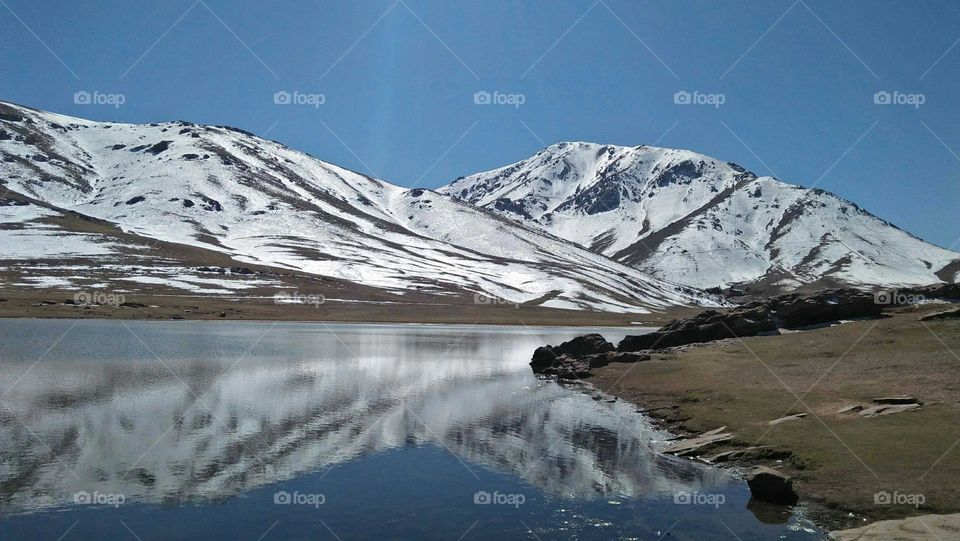 Beautiful higher mountain in Morocco covered by the snow.