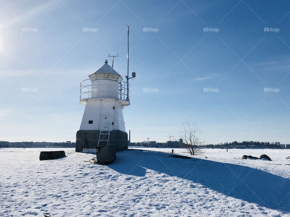 A light house on a sunny winters day