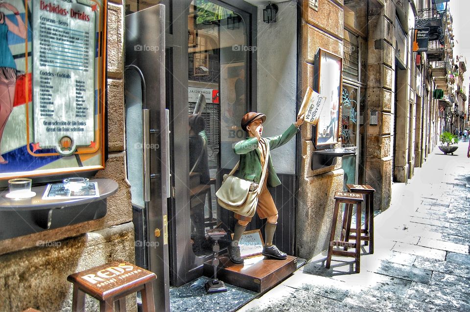 A model of the seller’s newspapers at the entrance to the cafe. Barcelona