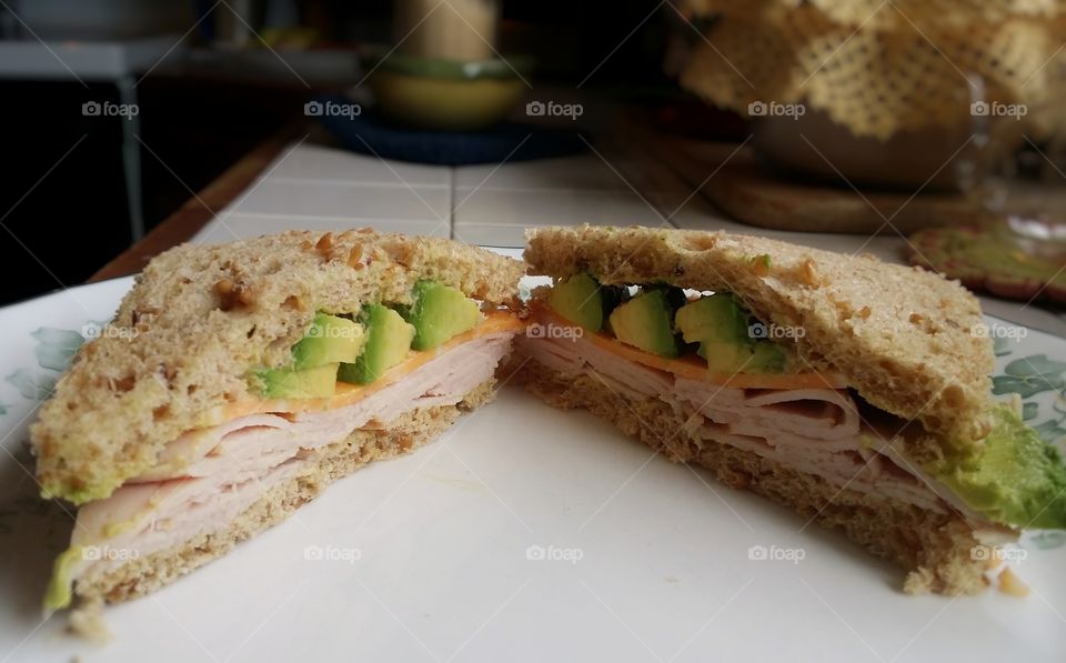 Crust less turkey avacado cheese dijon mustard on whole grain wheat bread favorite sandwich in the kitchen